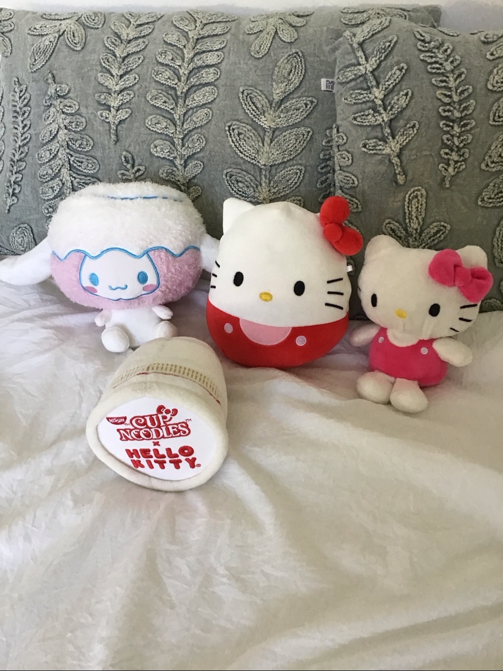 Lot of Four Hello Kitty plushes.
Nissin cup of noodles +